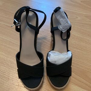Black wedge sandals